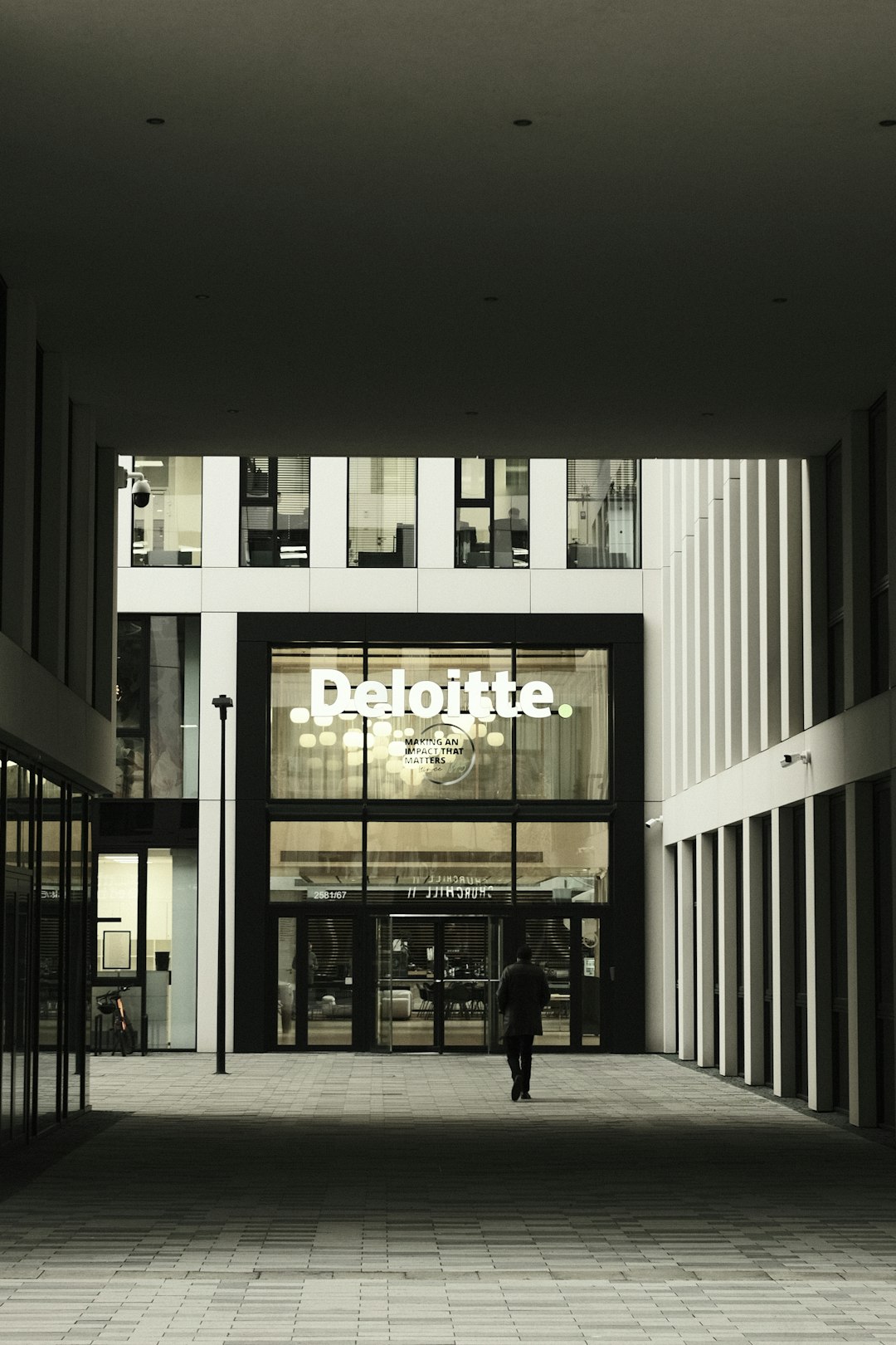 Entrance of Deloitte office in urban setting